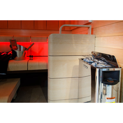 Harvia The Wall SW60 6kW in a sauna under red LED lighting