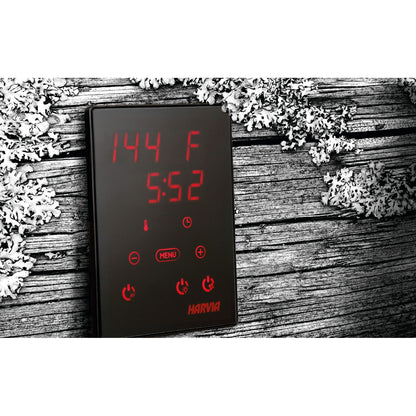 Harvia Xenio CX30 control panel shown against weathered wood