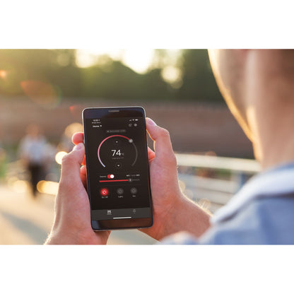 Adjusting the sauna temperature from a smartphone with the Harvia app, which connects to Xenio WiFi controls