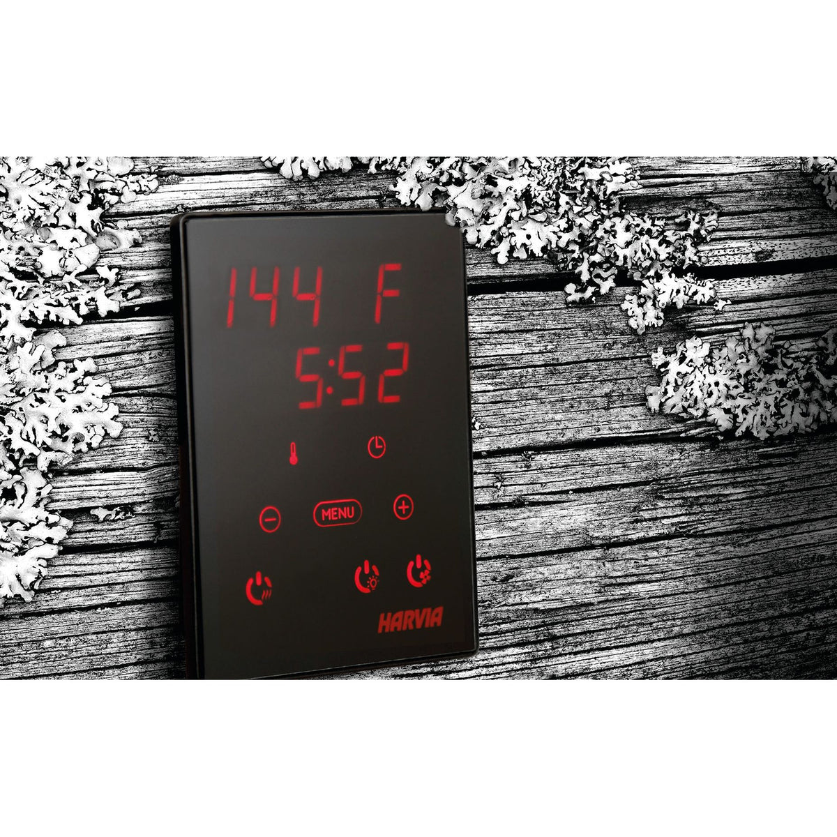 Harvia Xenio touch control panel showing the sauna temperature in Fahrenheit and the session timer, against weathered wood