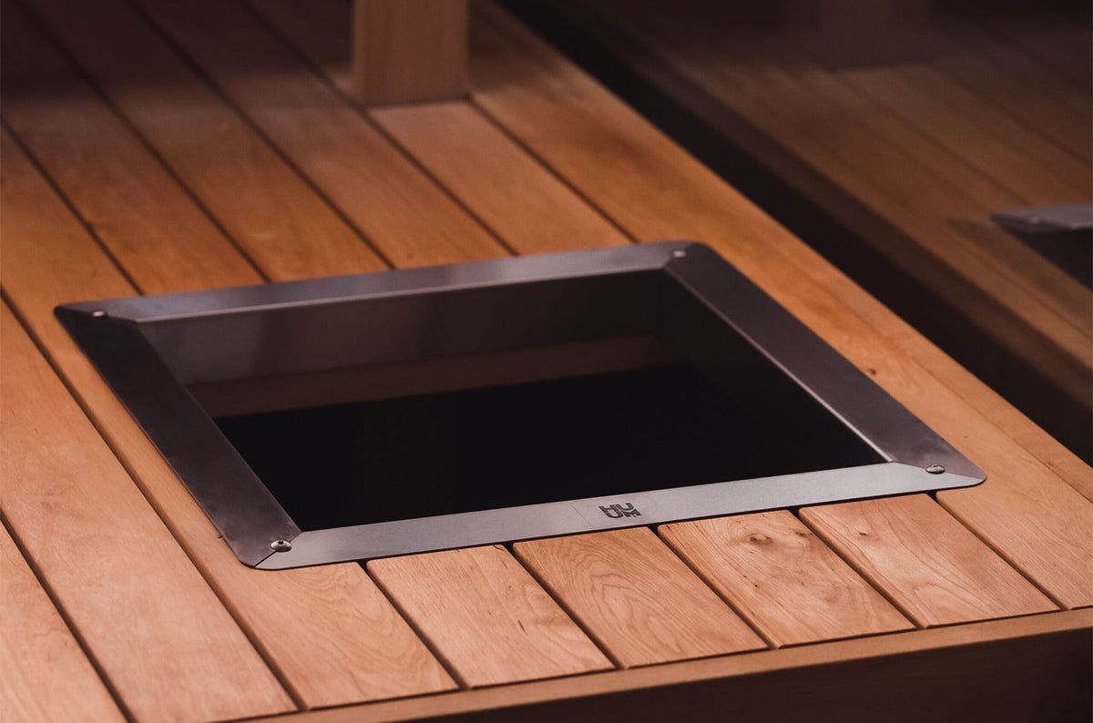HUUM heater recessed into a bench with the embedding flange