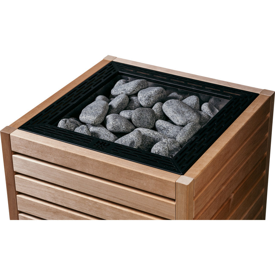 Top corner of a HUUM CORE with thermo-aspen panels and black top trim