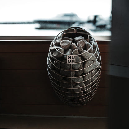 HUUM DROP mounted on the wall of a finished sauna