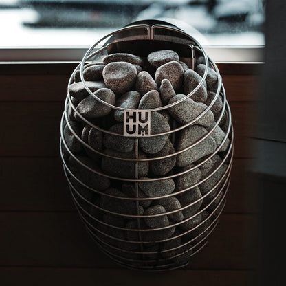 HUUM DROP 9 sauna heater mounted in a sauna
