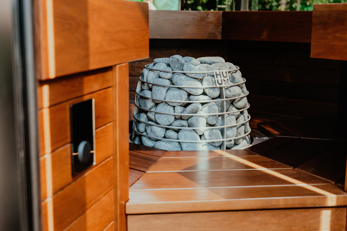 HUUM HIVE Mini set into a recess in a sauna bench