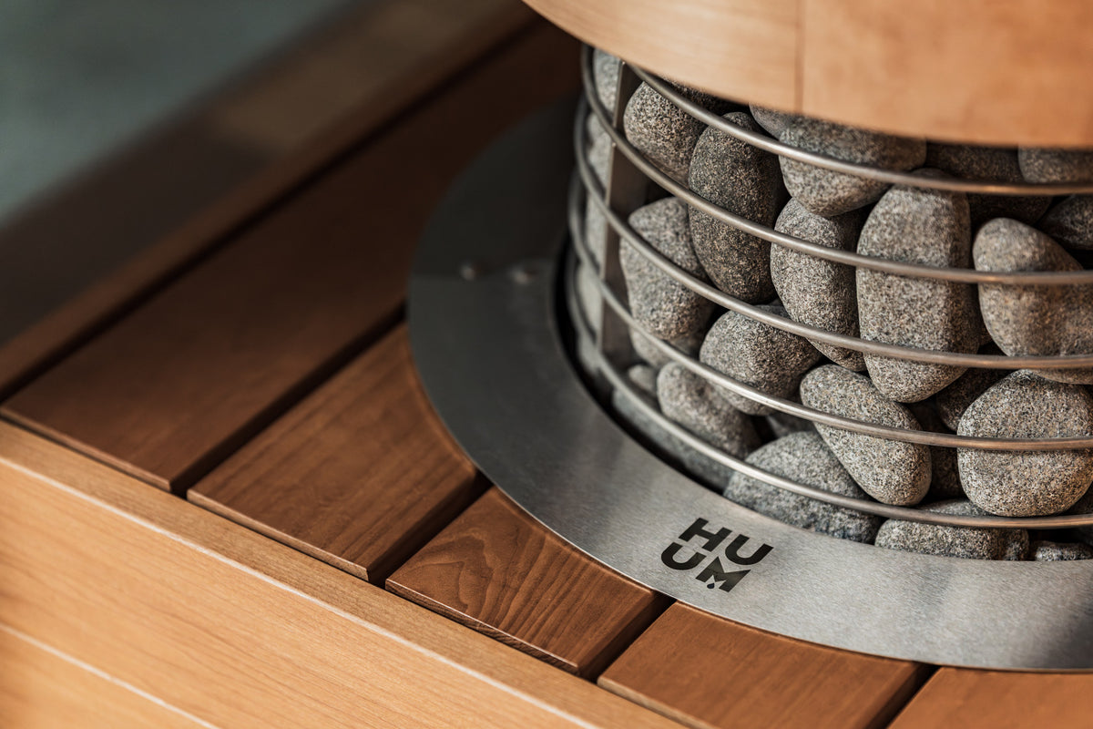 HUUM HIVE Mini set into a bench with the embedding flange