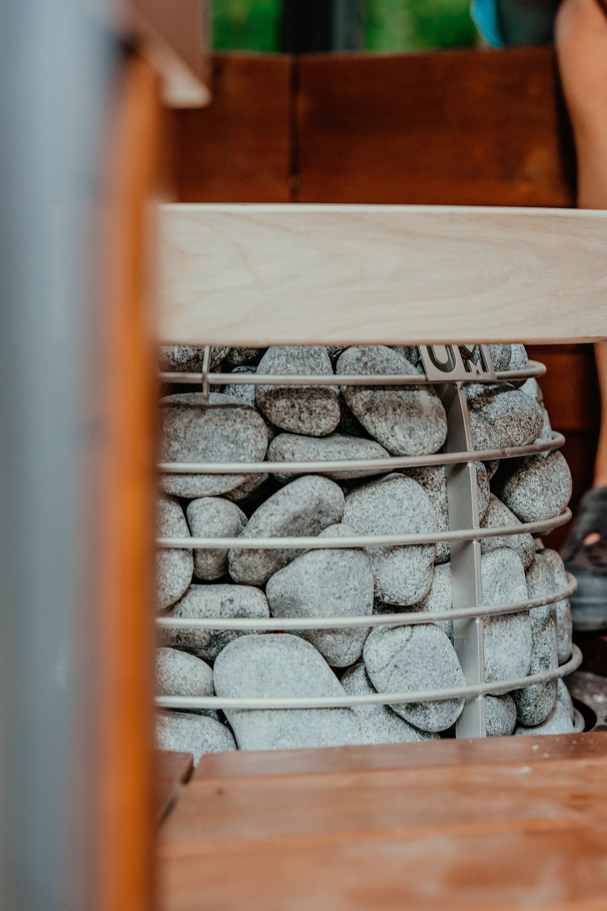 HUUM HIVE Mini under a sauna bench board