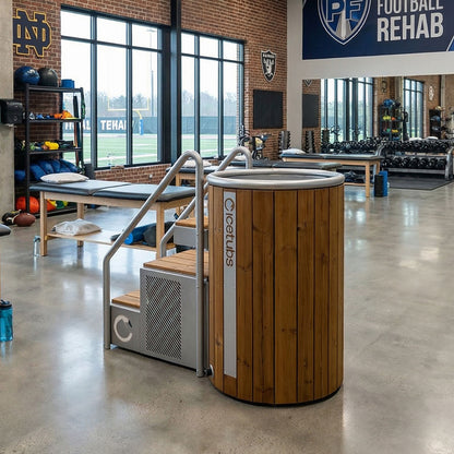 Icetubs IceBarrel Thermowood & Stainless Steel Cold Plunge Tub, installed in a sports rehabilitation facility