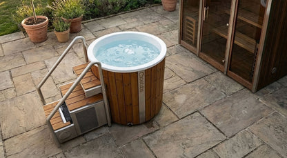 Icetubs IceBarrel XL Thermowood & Fiberglass Cold Plunge Tub, installed outdoors on a garden patio