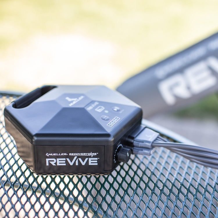 Mueller REVIVE M2 Console with compression sleeve in use