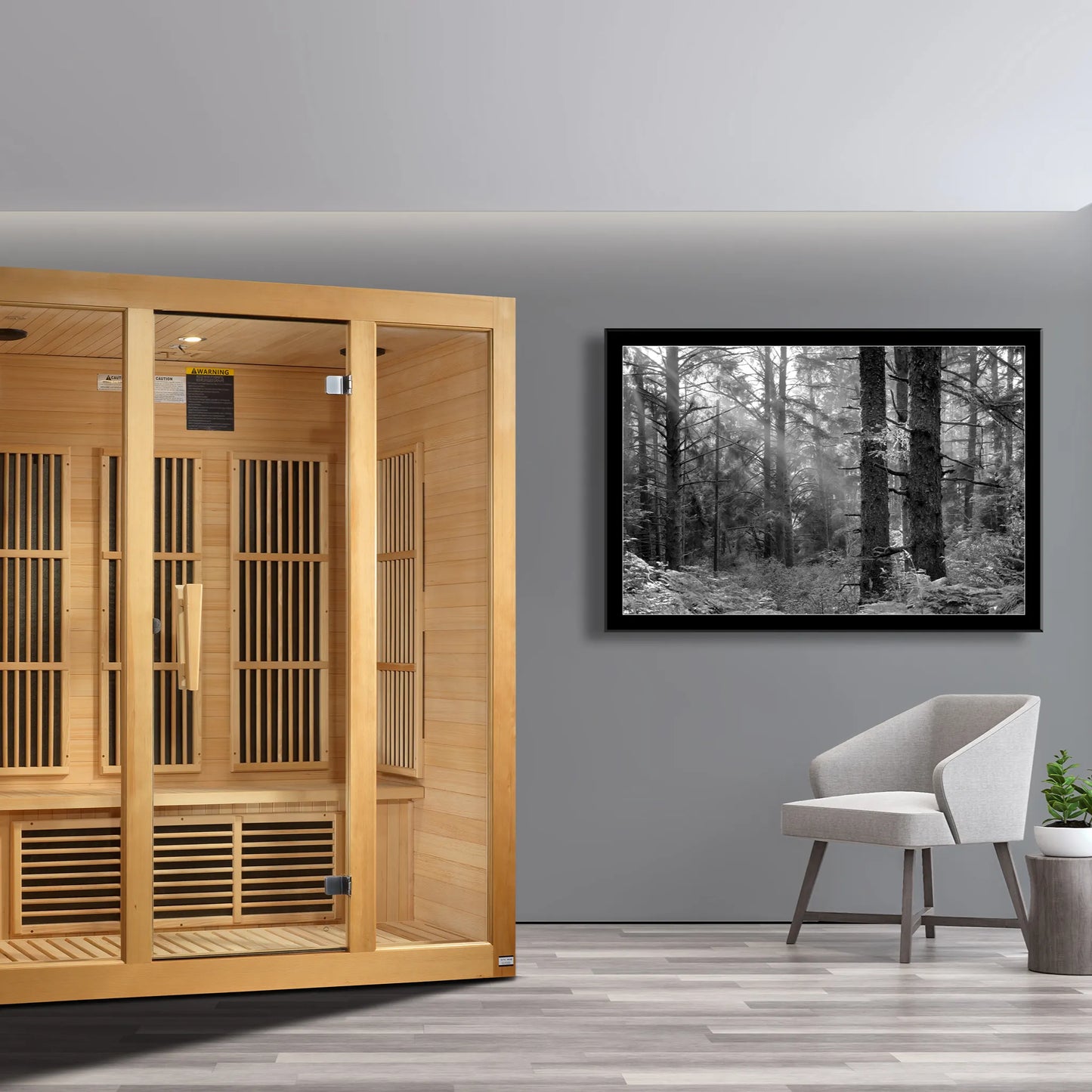 Lifestyle room view of the Maxxus Bellevue 3-Person Low EMF FAR Infrared Sauna, highlighting the natural Canadian Hemlock wood finish. Model MX-J306-01.
