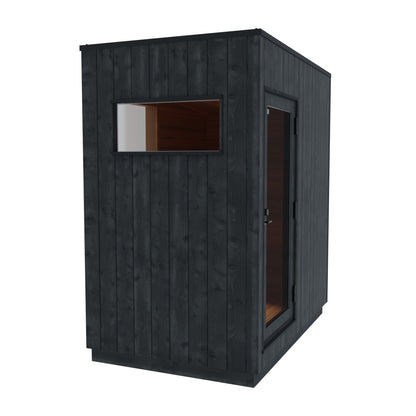 ThermaSol Nordic Misty Changing Room module, three-quarter studio view in charred black cladding with a window and door