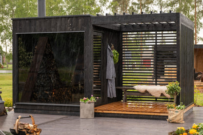 Nordic Misty Privacy Fence screening a deck beside the sauna