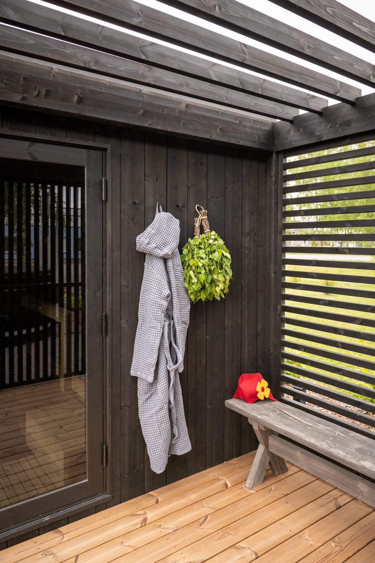 Privacy Fence panel in place, robe and planting on the deck in front