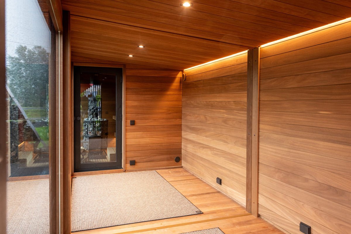Empty Nordic Misty Lounge interior with concealed cove lighting along the cedar ceiling