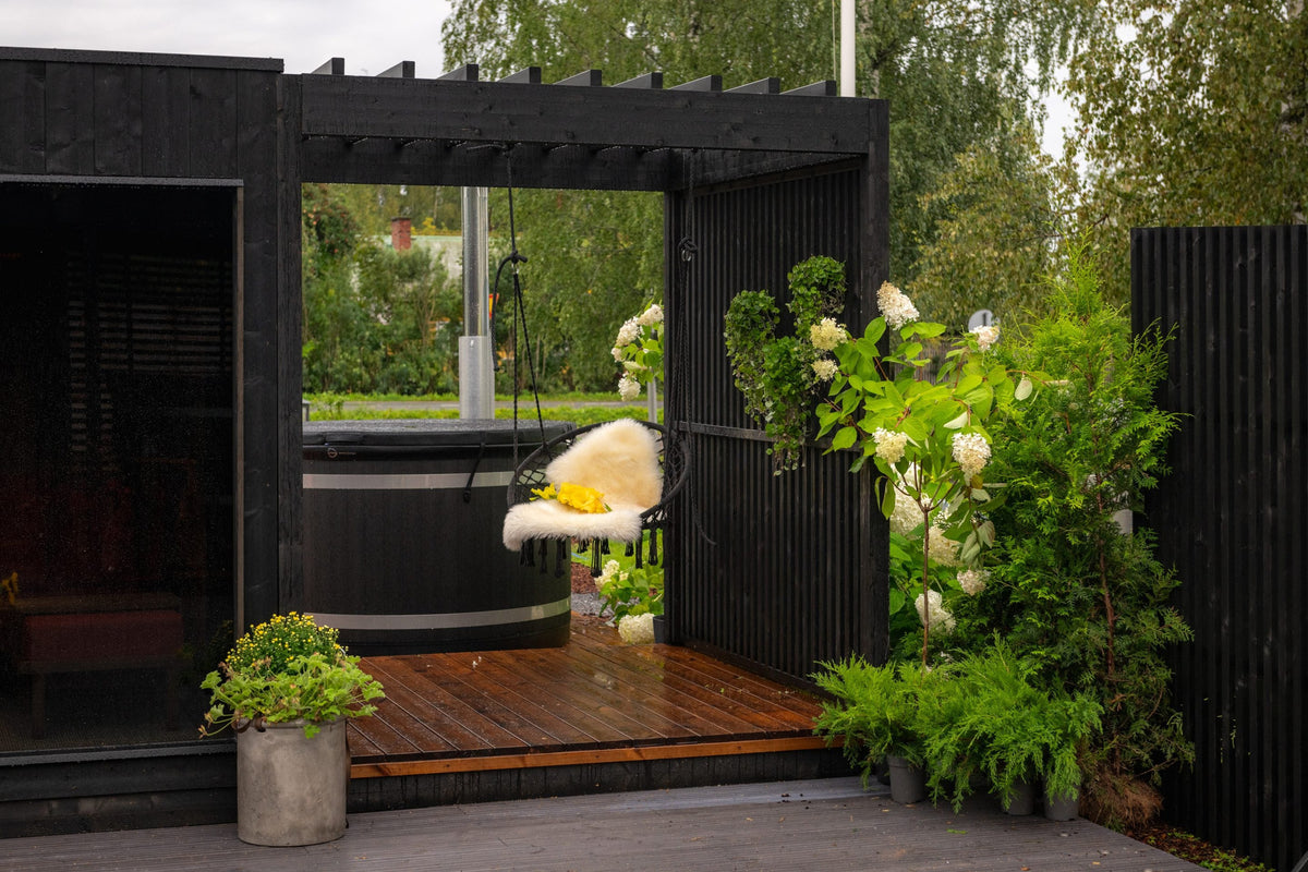 Nordic Misty Pergola alongside the sauna, planting in the foreground