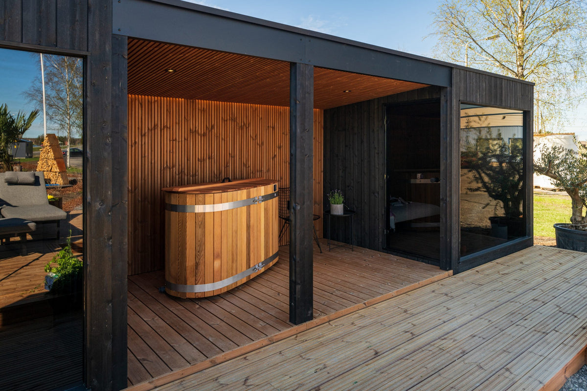 Nordic Misty Terrace in use, decked area sheltered by the black frame