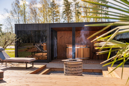 Nordic Misty Terrace with outdoor furniture and a wood-fired tub on the deck