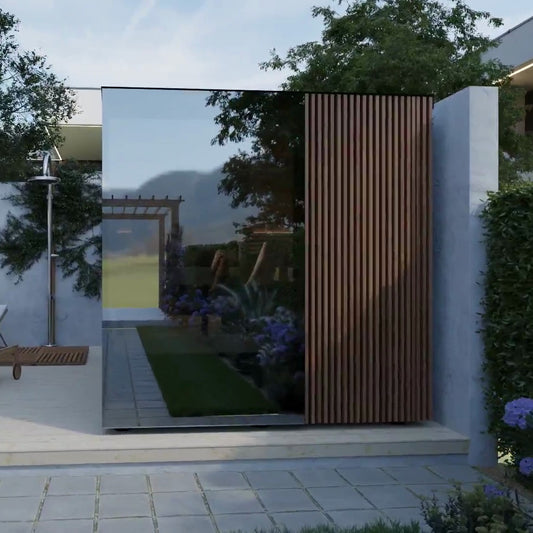 ThermaSol Ombra outdoor sauna cabin, mirror glass front and ribbed wood door in a walled courtyard