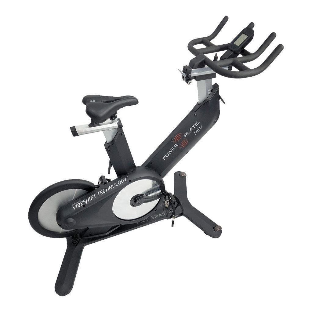 Power Plate REV seen from the front at an angle, showing the handlebars and seat post