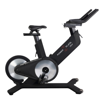 Power Plate REV vibration exercise bike in matte black, side view with the VibeShift gearbox and rear flywheel