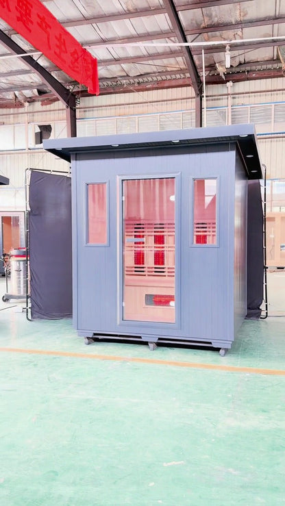 SunRay Pacific outdoor infrared sauna walkaround film: gray flat roof cabin with a glass door and two front windows, then the infrared heaters and benches inside