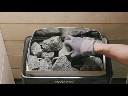 Harvia official video: stacking sauna stones and installing the heater