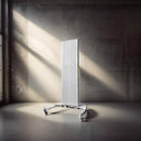 BioLight ReJuvenate panel mounted on a rolling floor stand in a sunlit concrete-walled room