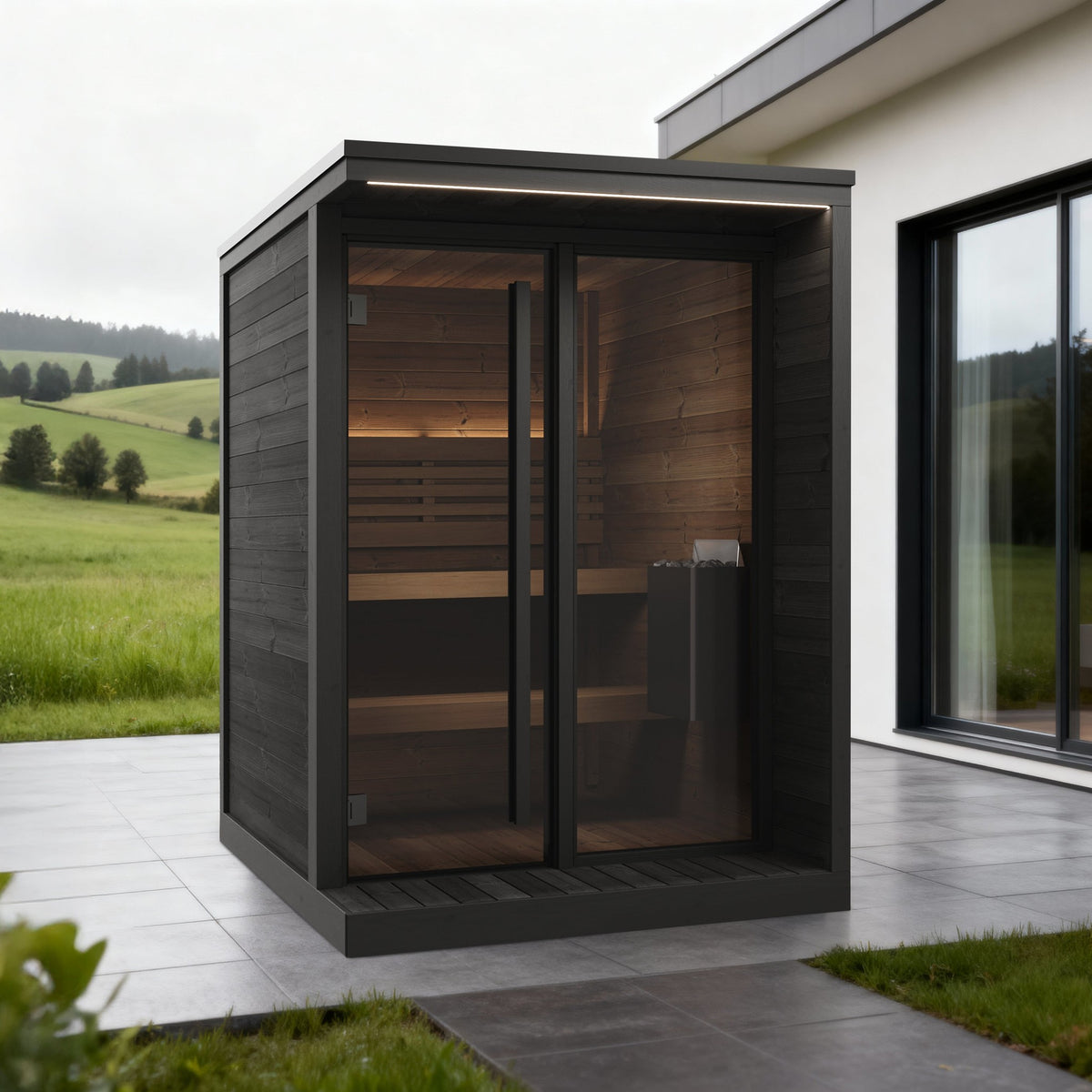 SaunaLife GL4 Garden Luxury 4-Person Outdoor Sauna Kit, black finish, on a patio beside a modern house