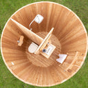 Looking down into a LeisureCraft Skylight with the cedar interior walls dividing the shower side from the washroom side