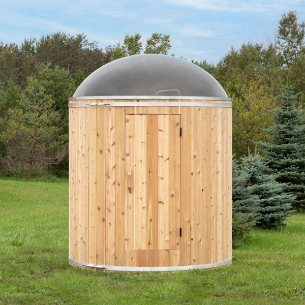 Dundalk LeisureCraft Skylight with the door closed: a single cedar leaf on two black hinges, the acrylic dome above the top band