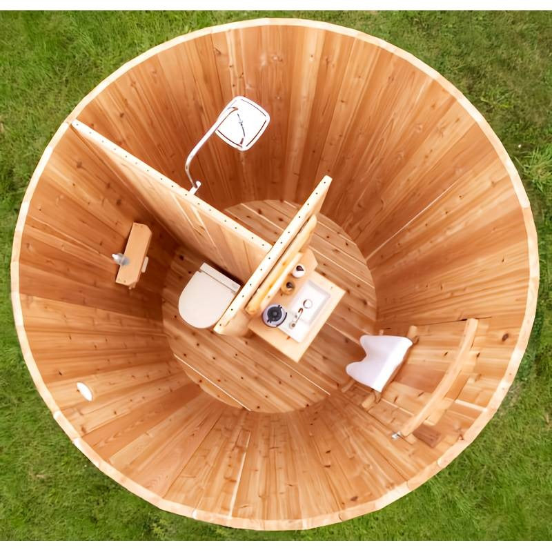 Top view into the Skylight with the dome off, showing the optional partition wall, shower, vanity and toilet arranged in the cedar circle.