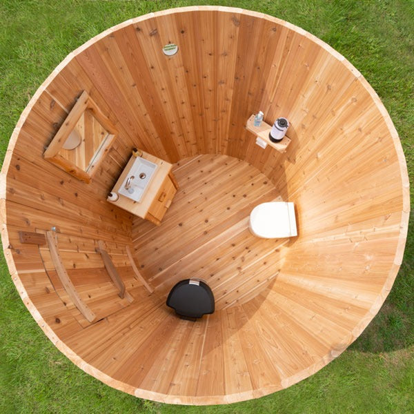 Top view of the Skylight with the optional Separett toilet, vanity, mirror and shelf fitted, and no partition wall dividing the circle.