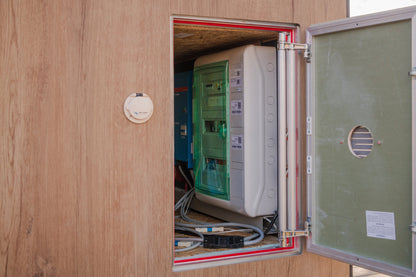 ThermaSol Solaris power and battery compartment, door open