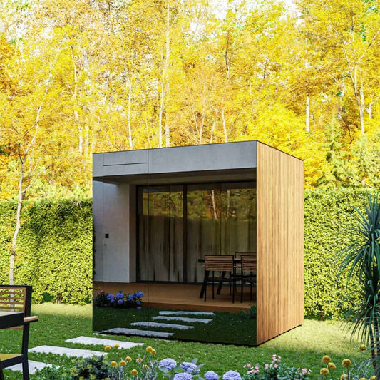 ThermaSol Spectra outdoor sauna cabin in a garden, Tyrol timber and glass front
