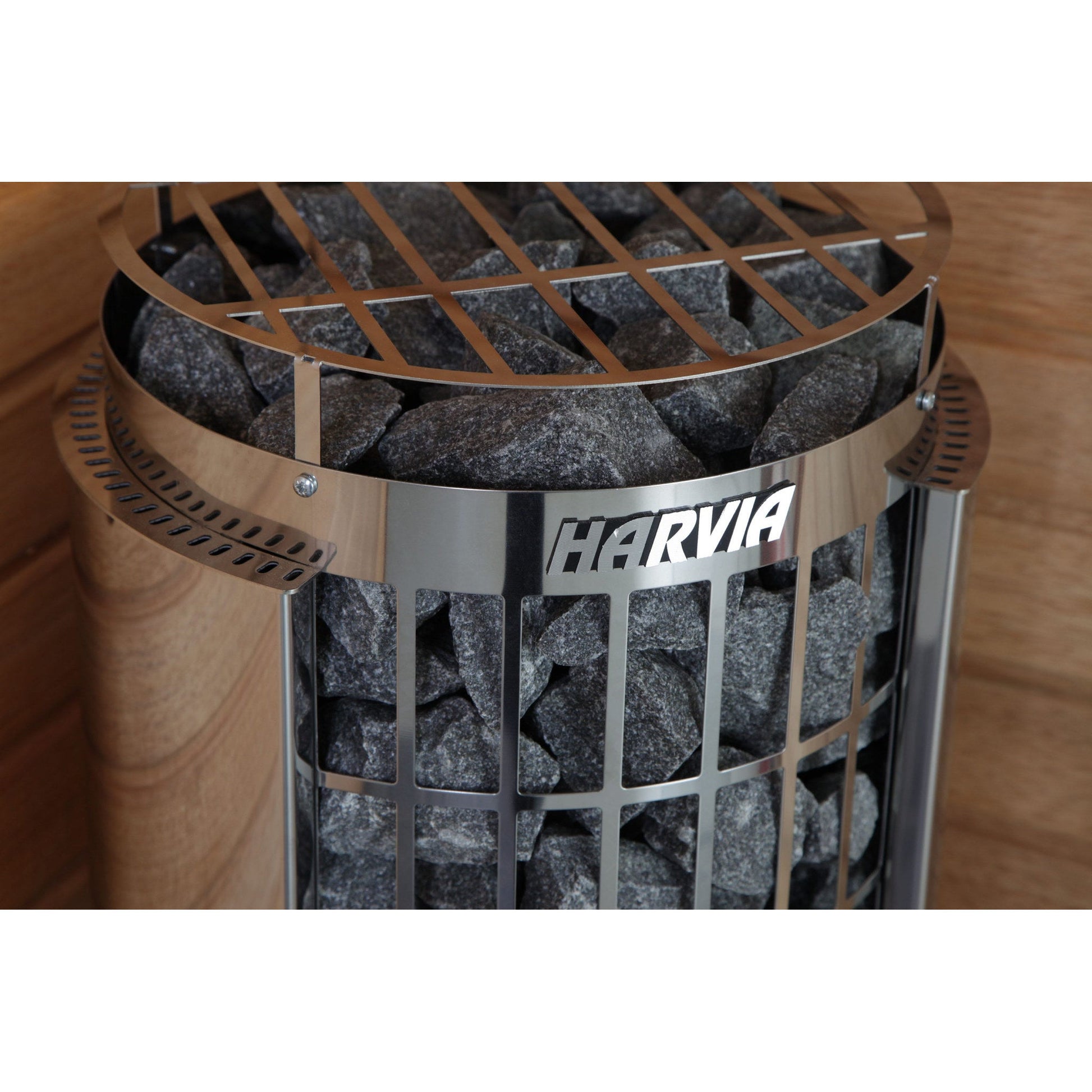 Close view of the Harvia badge on the Cilindro stone column against a sauna wall