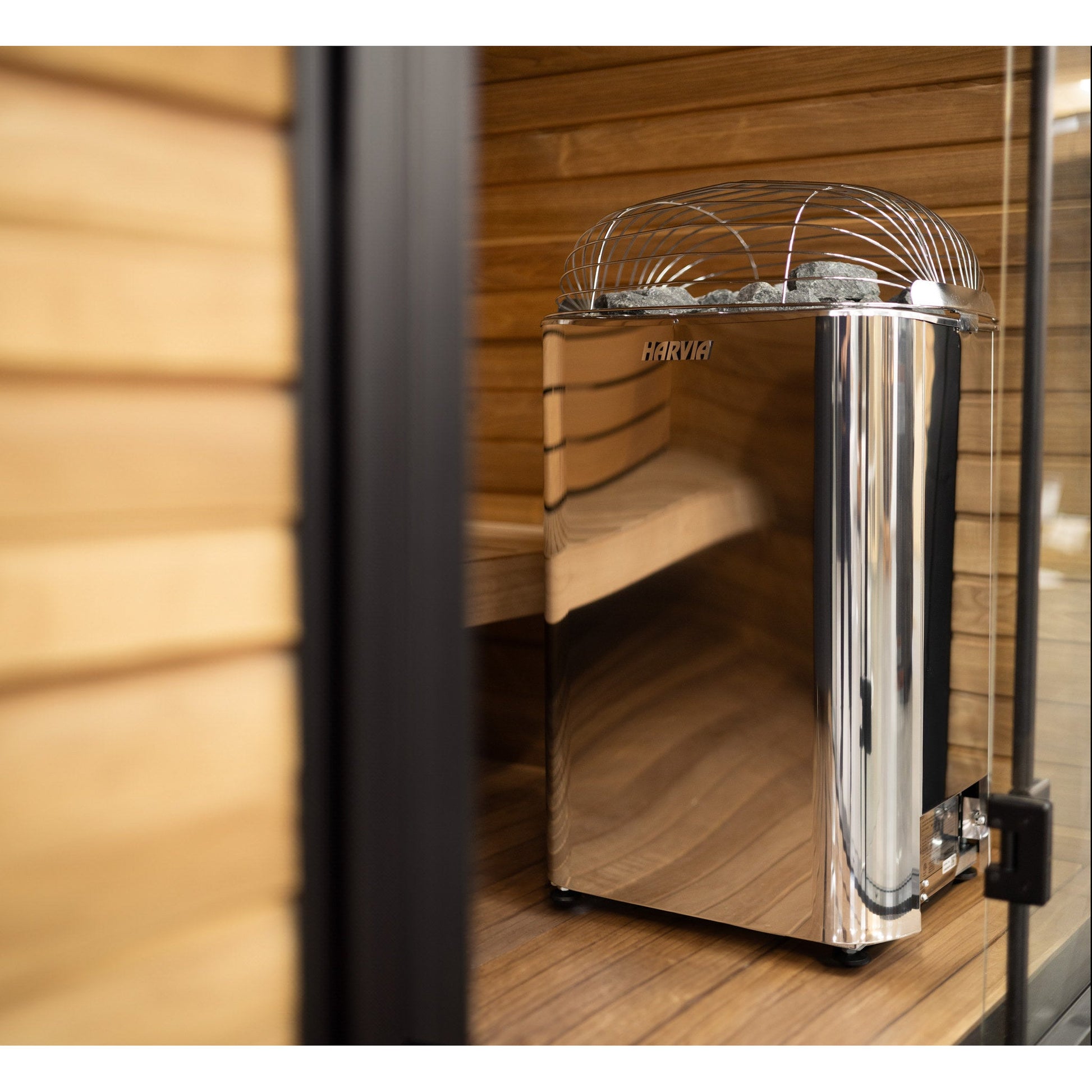 Harvia Club sauna heater with the service panel open, showing the internal build