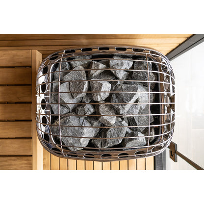 Harvia Club sauna heater from above, showing the full stone bed beneath the guard