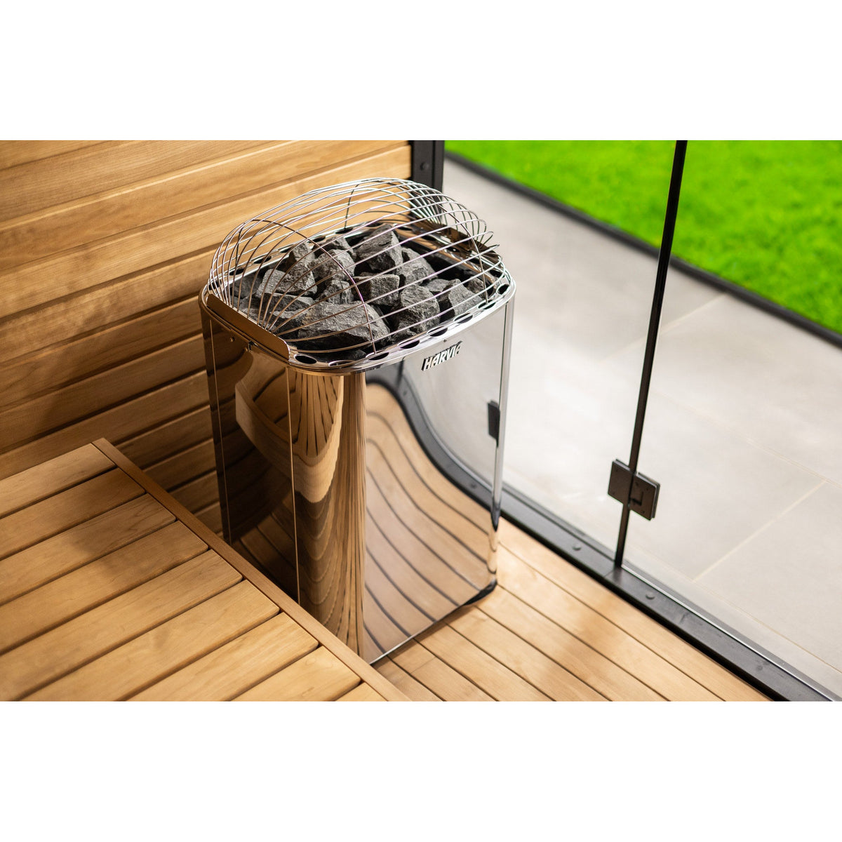 Three quarter view of the Harvia Club sauna heater and its curved stainless cabinet