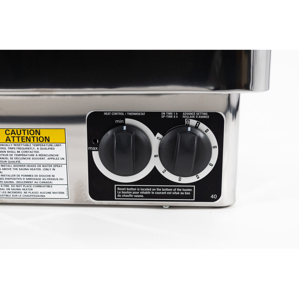 Close view of the timer and thermostat dials built into the base of the Harvia KIP B