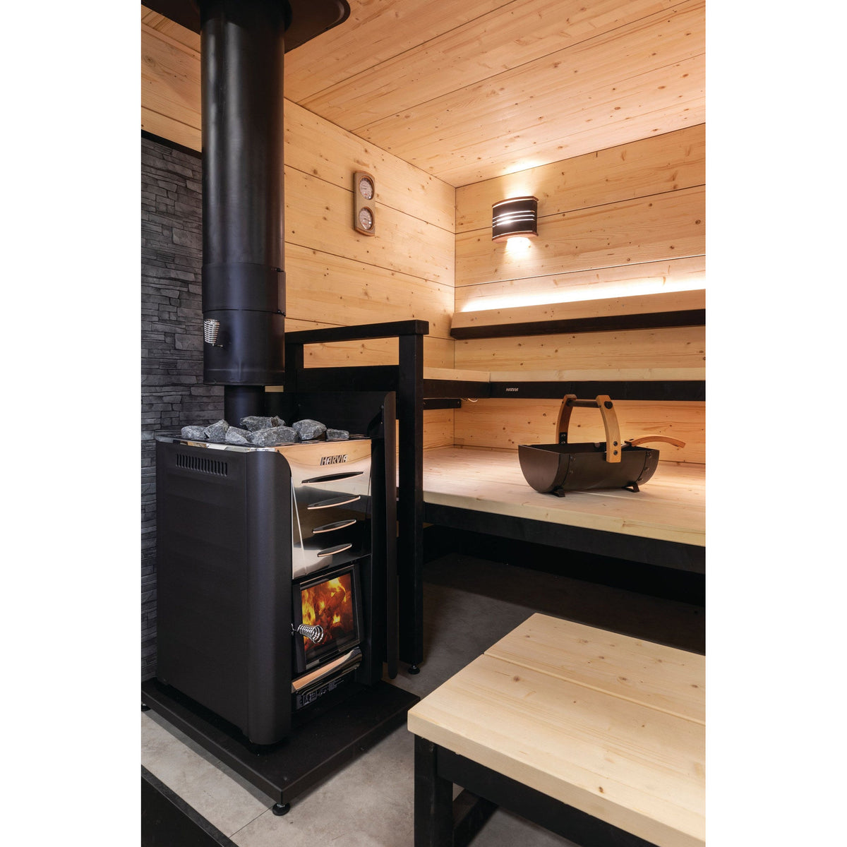 Harvia Pro wood-burning stove in a timber sauna room