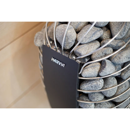 Close view of the Harvia Spirit stone cage and graphite black brand plate