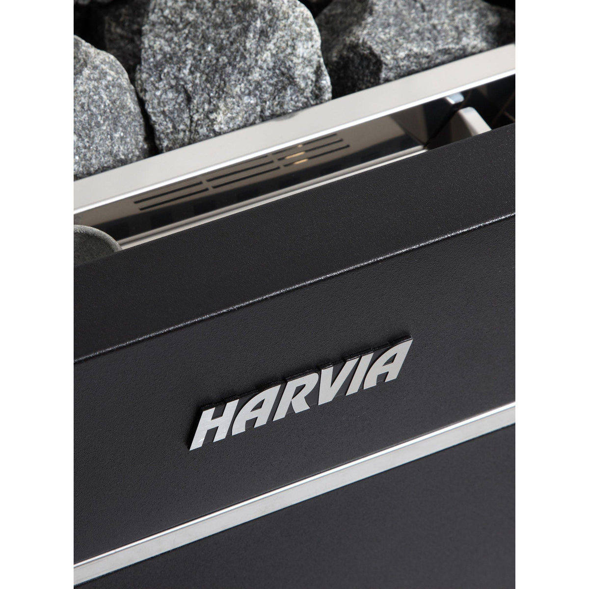 Close view of the Harvia brand plate and stone rim on the Virta heater cabinet