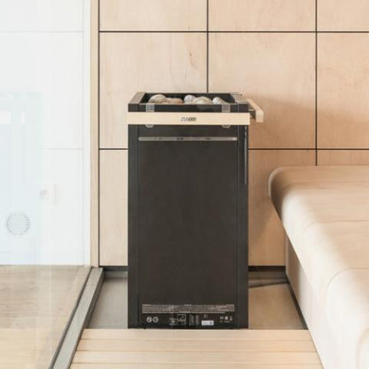 Harvia Virta HL90E electric sauna heater installed in a finished sauna room