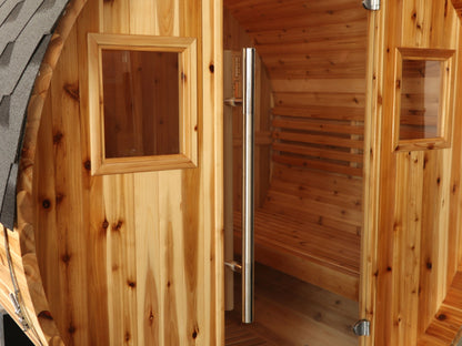 Close view of the SunRay Aurora front: full glass door with a long steel pull handle between two framed windows