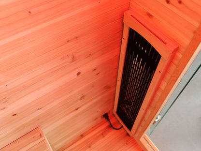 Infrared heater panel standing in the front corner of the SunRay Burlington beside the door