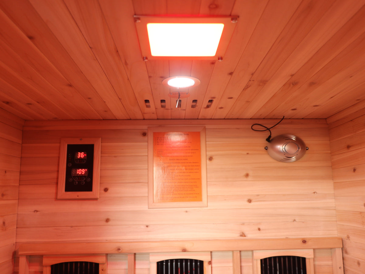 SunRay Burlington ceiling light above the control panel and the back wall heater panels