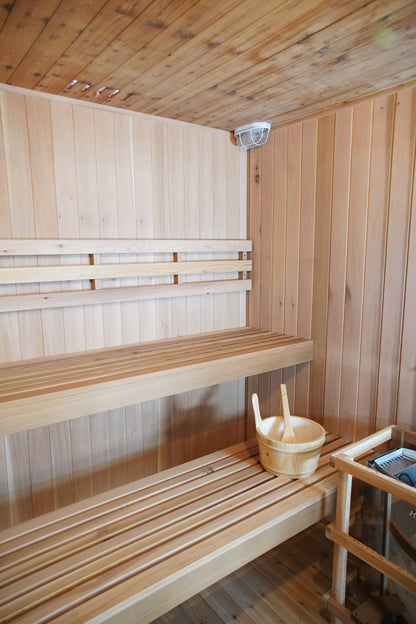 Upper and lower benches below the ceiling light and vents inside the SunRay Charleston, bucket on the lower bench