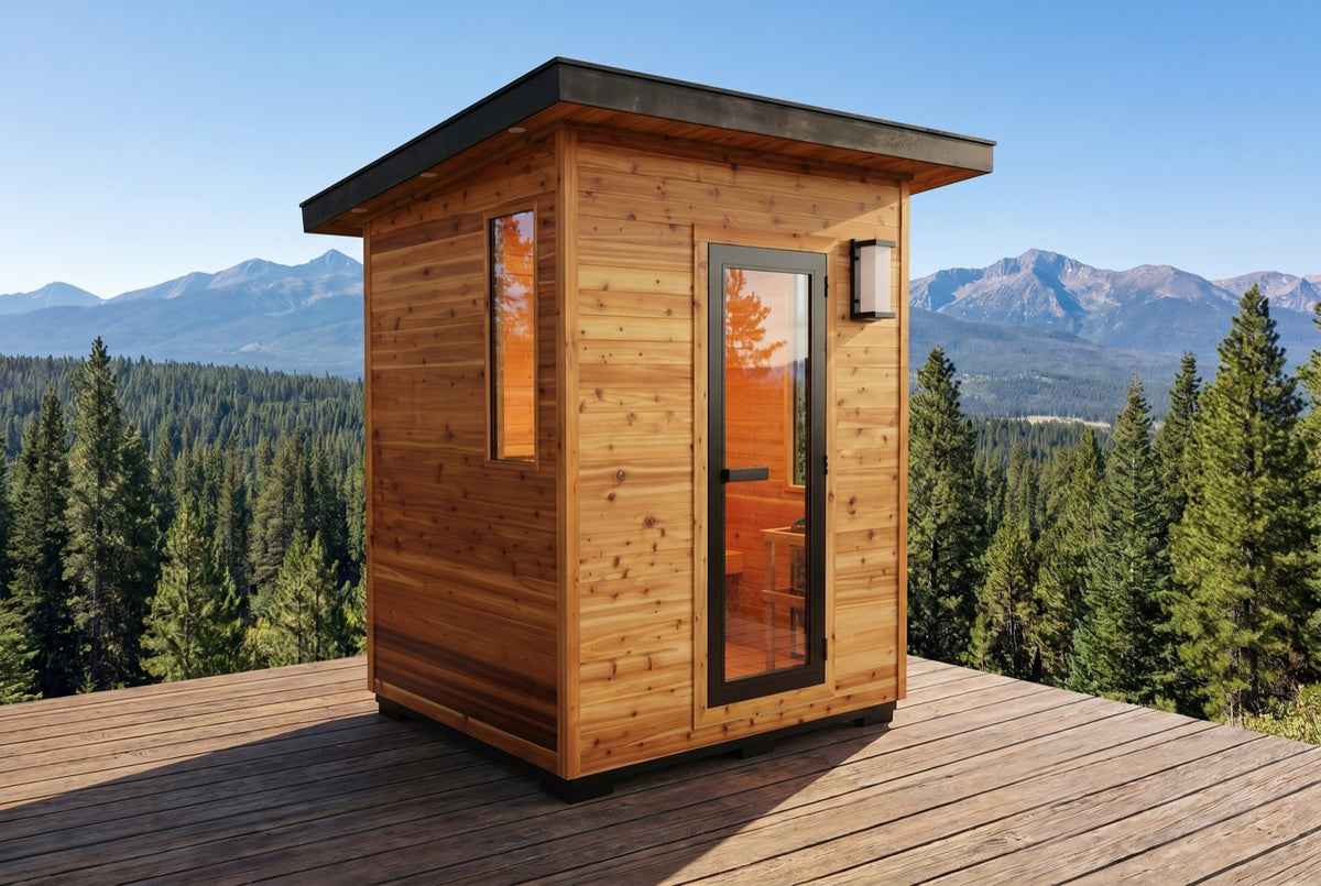 SunRay Denali outdoor sauna on a wooden deck overlooking a mountain forest