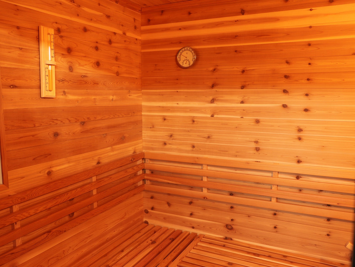 Corner inside the SunRay Denali with the sand timer, hygrometer and backrest above the L-shaped bench